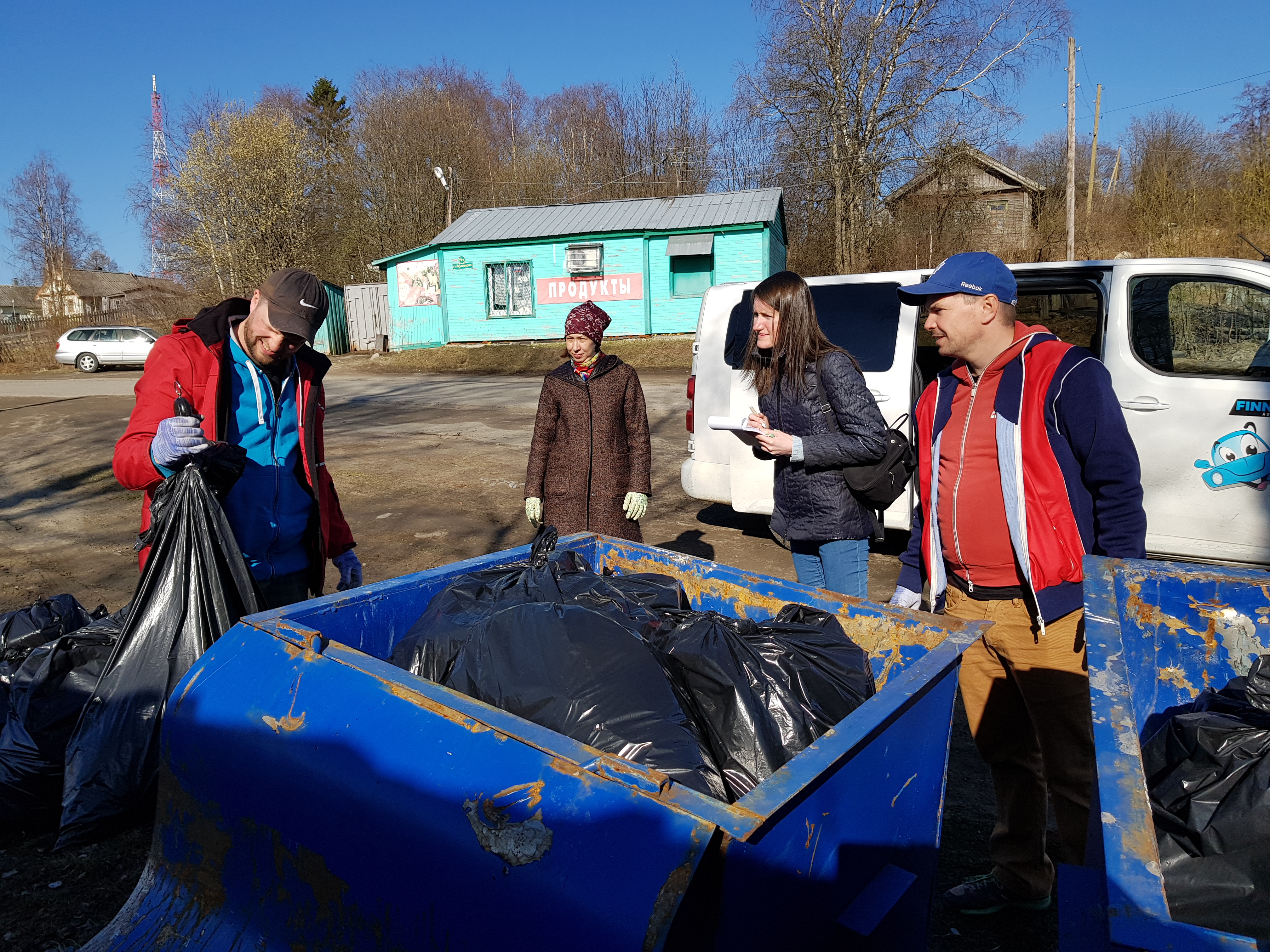 Measuring collected waste in Vedlozero, Russia